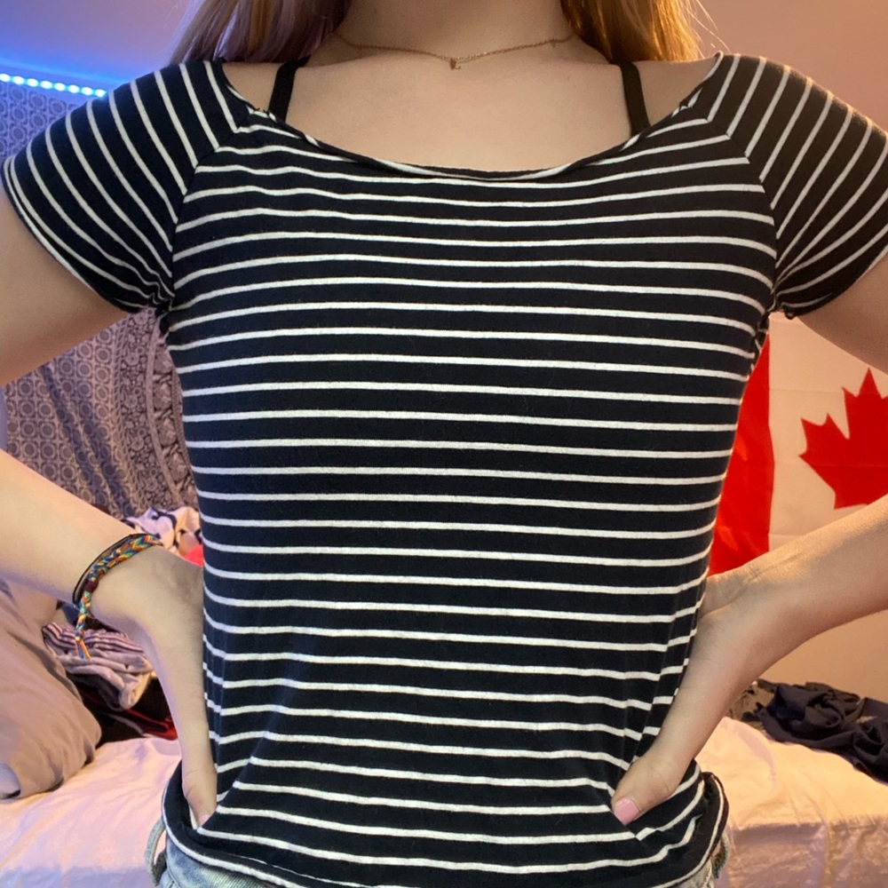 Striped navy blue shirt. John Galt